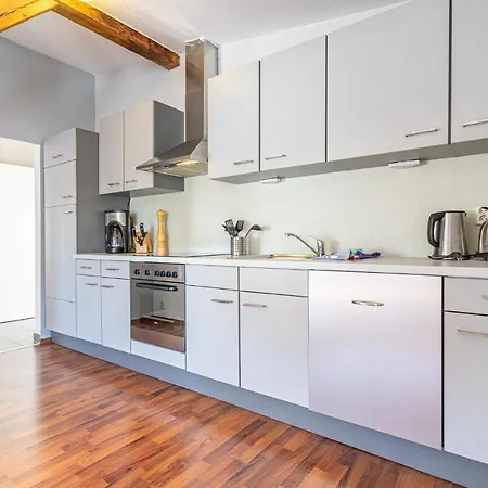 - 3 Im Appartementhaus Hafenriff